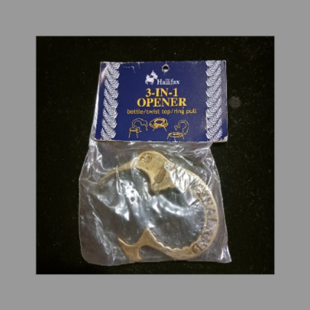 Sealed vintage bronze Kiwi 3-in-1 opener